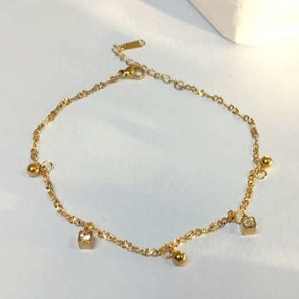 The Charmed Life Bracelet: Gold Bead & Geometric Charm