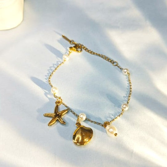 The Ocean Shore Bracelet: Gold Starfish, Seashell & Pearl Charm Bracelet