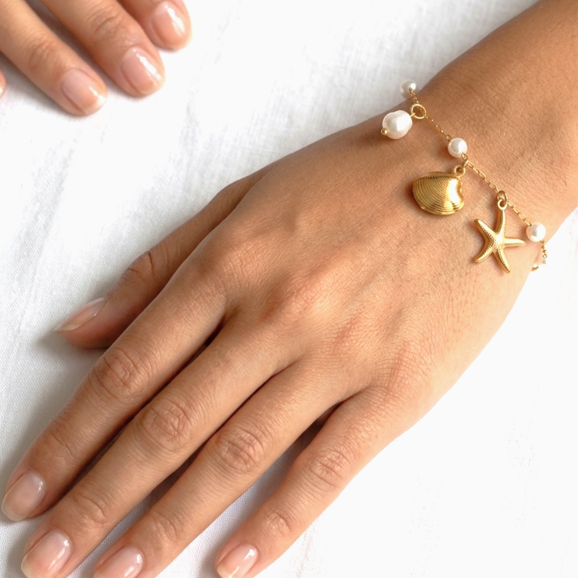 The Ocean Shore Bracelet: Gold Starfish, Seashell & Pearl Charm Bracelet